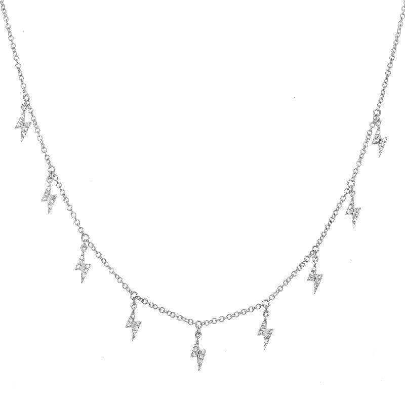 Silver lightning bolt charm necklace from our jewelry brand collection, delicate chain with multiple lightning bolt pendants.