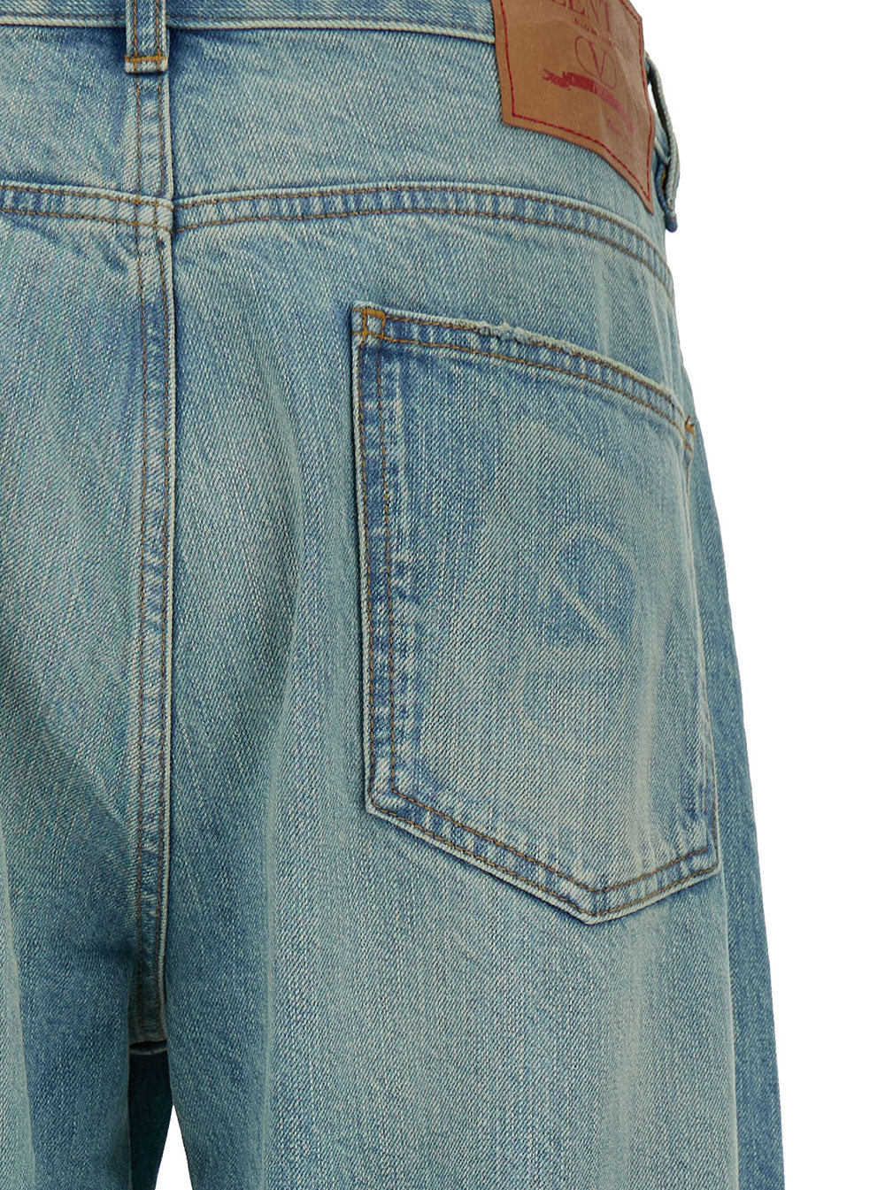Valentino Men Light Blue Oversized Jeans With Logo Patch In Denim Man