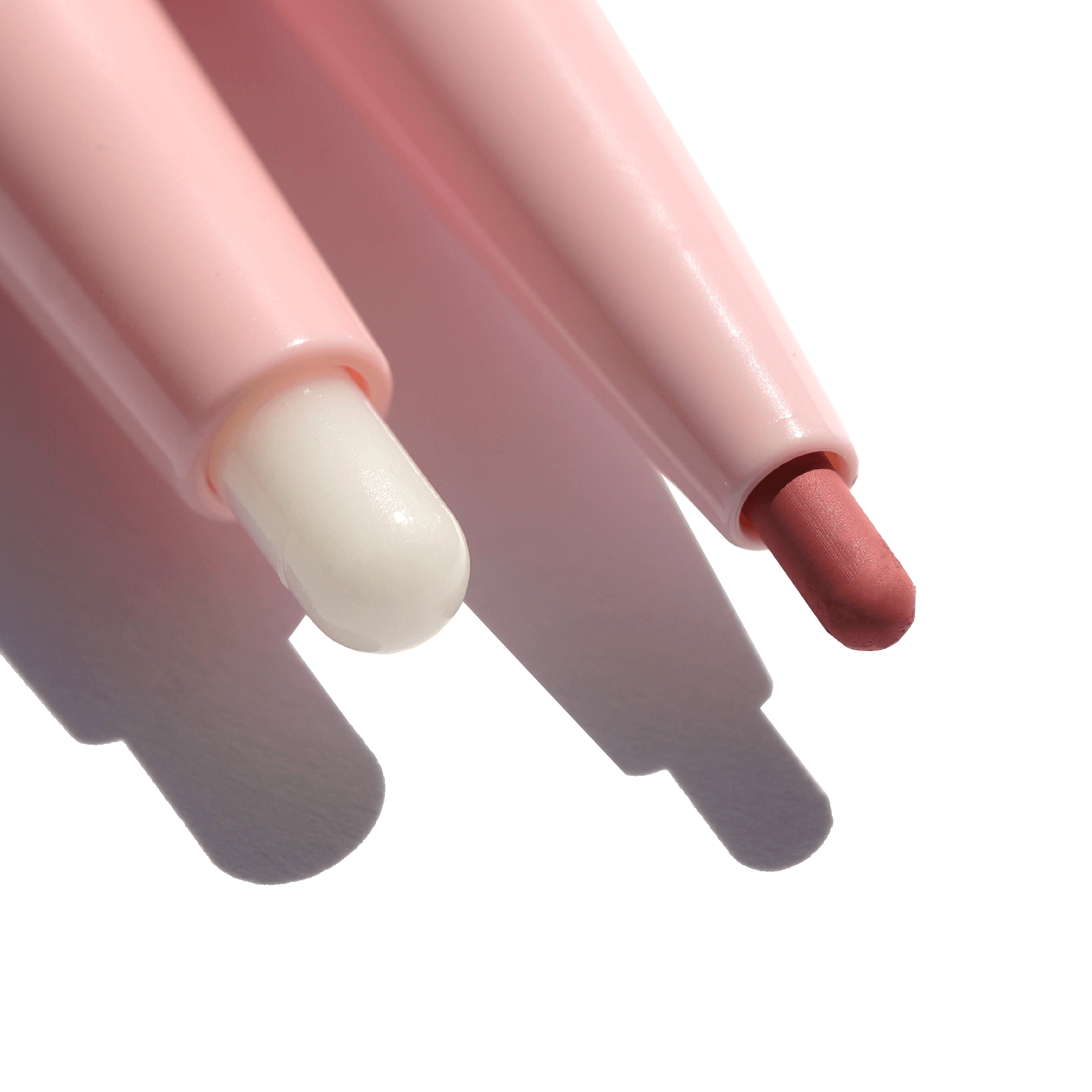 Close-up of The Script Primer + Lip Liner, showing two pink retractable lip liners designed for long-lasting, smudge-proof lip wear.