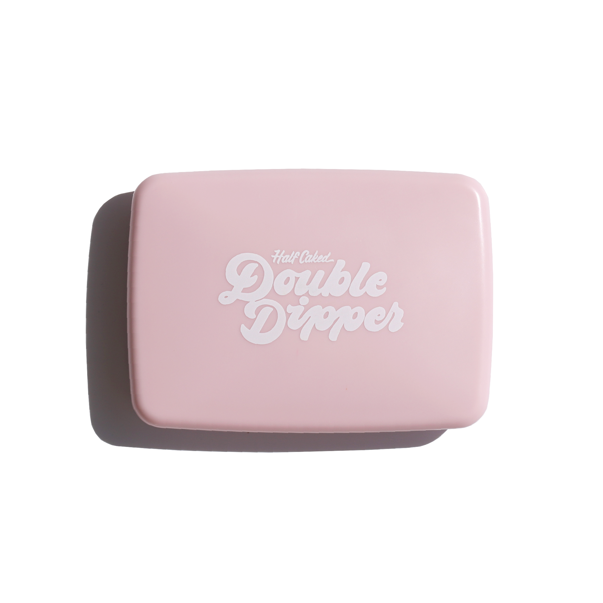 Double Dipper Color Duo: A pink rectangular case with white text, containing a buttery-soft highlighter and blush/bronzer duo for a natural, luminous finish.