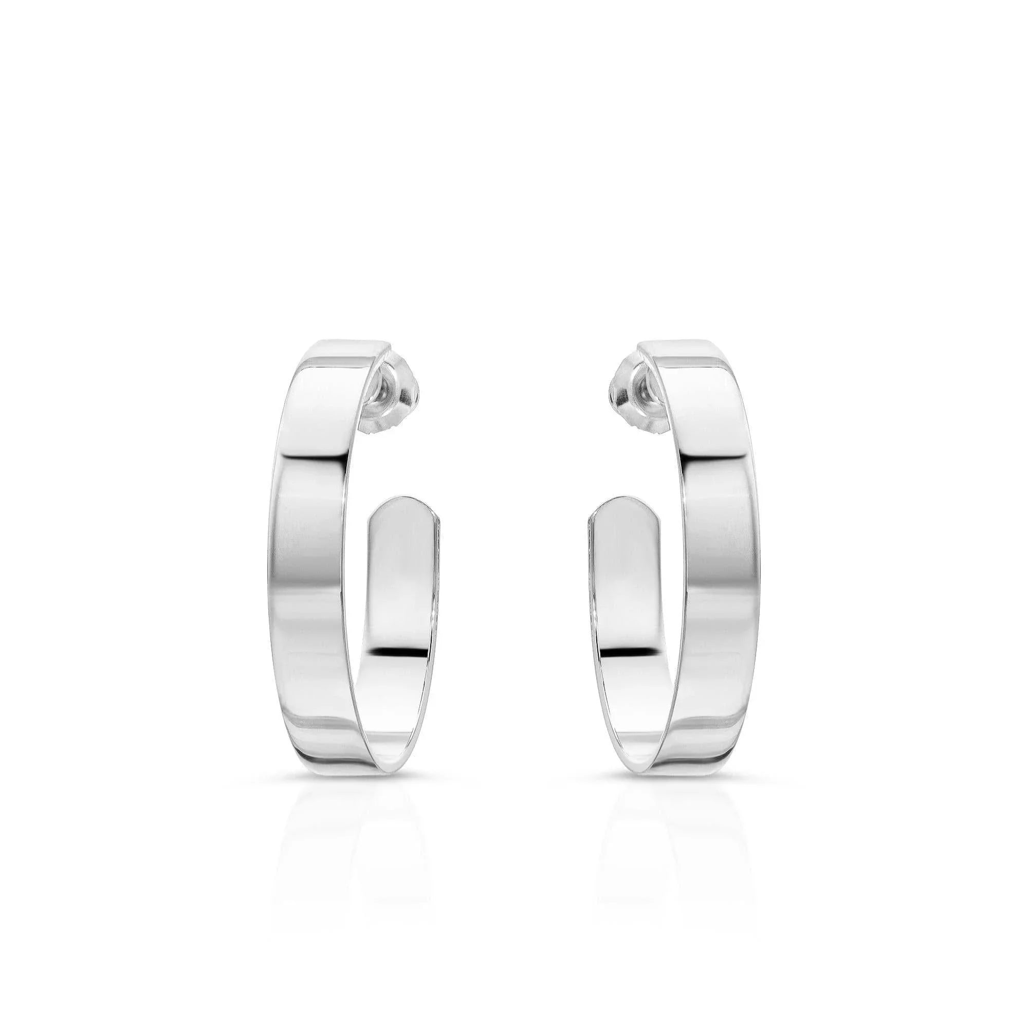 Shiny silver hoop earrings named 1 Isla Hoops showing a cute pair of 1-inch hoops