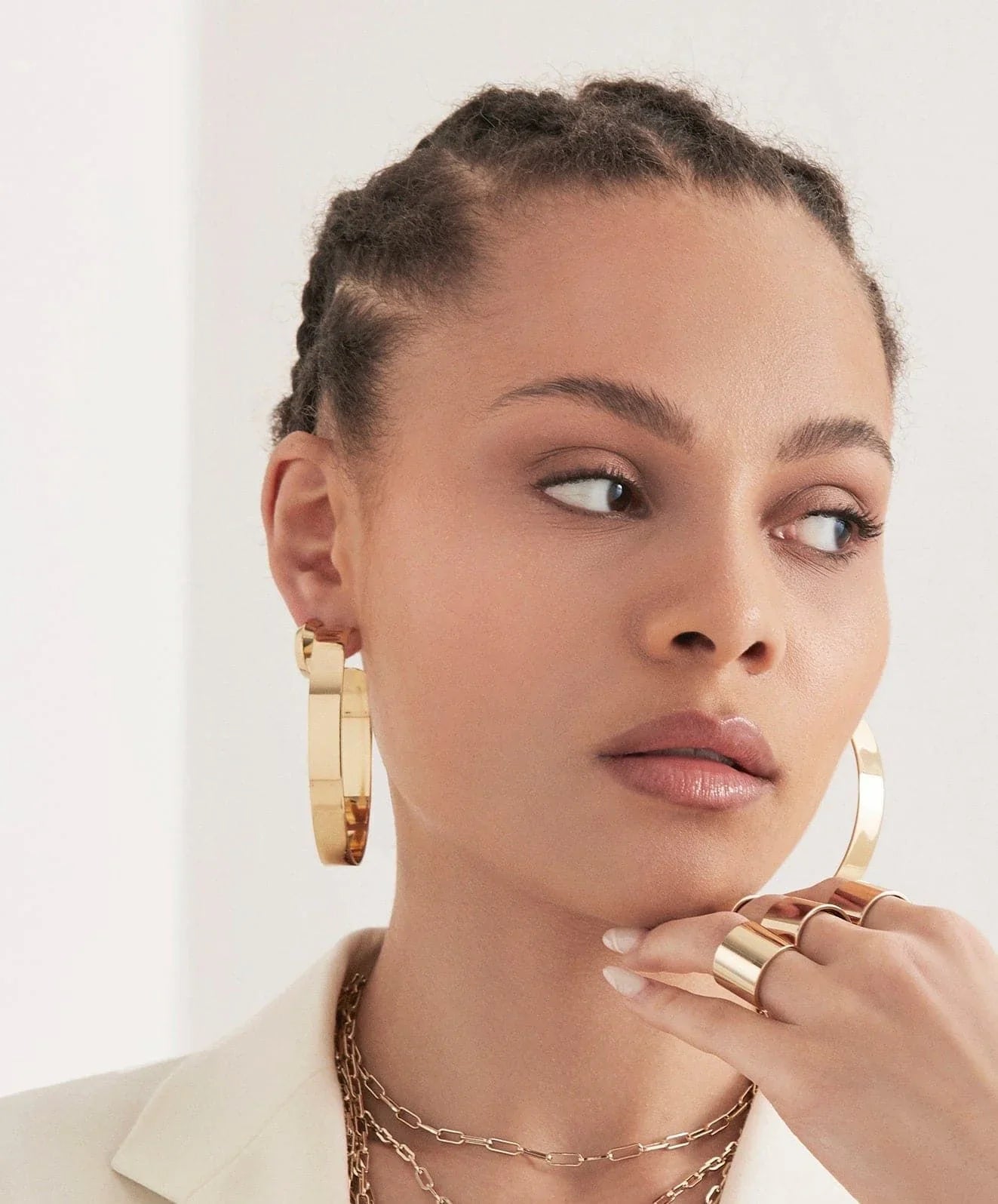 Woman wearing stylish Large Flat Hoops gold jewelry accessory