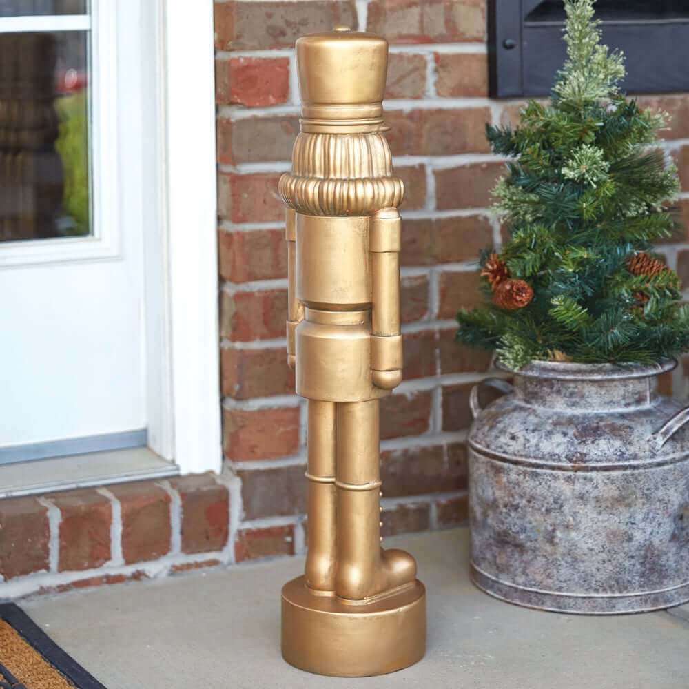Regal Golden Nutcracker Statue Christmas Decor