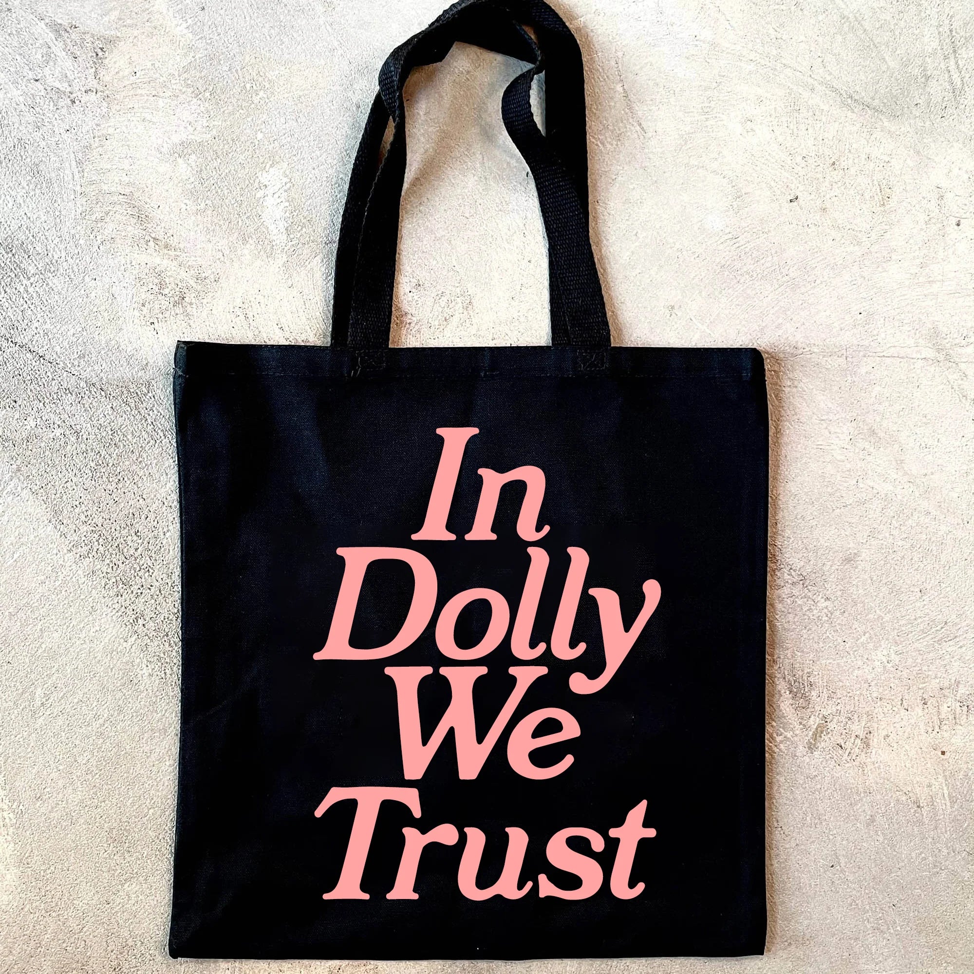 In Dolly We Trust Tote Bag by BOBBYK