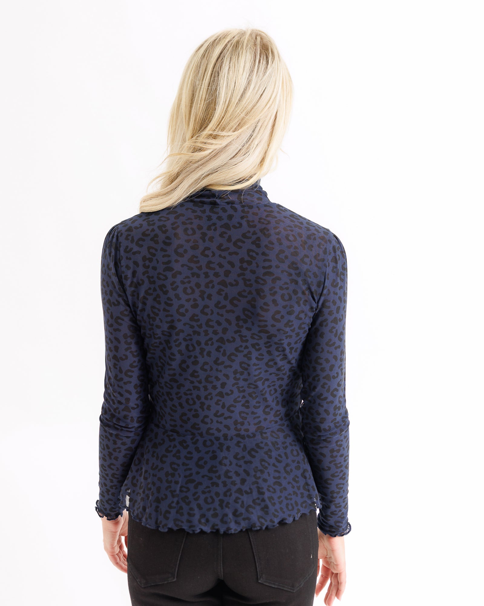 Peplum Turtleneck Top