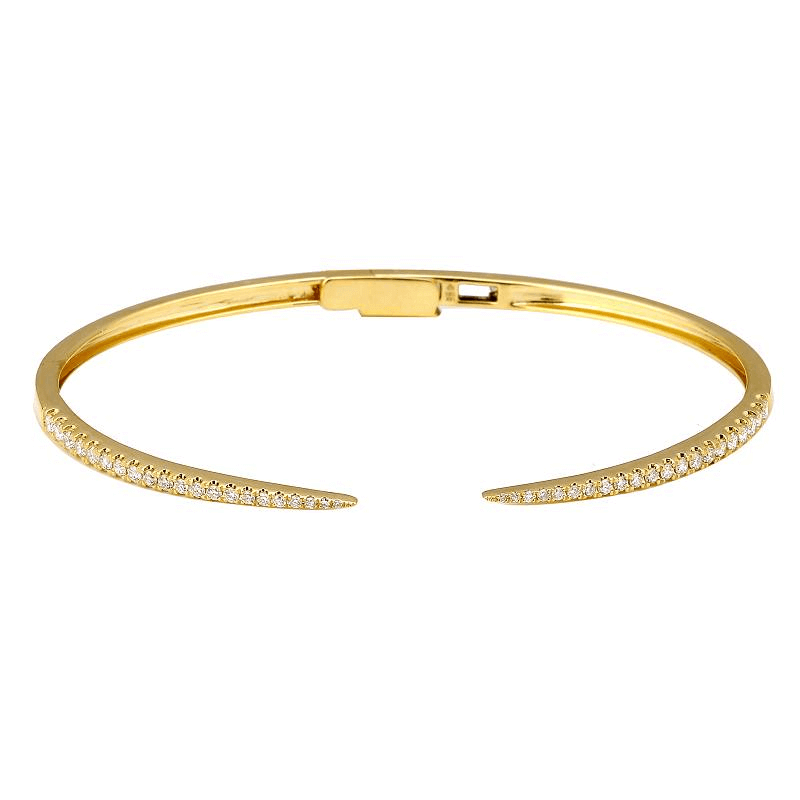 Gold bracelet with diamond accents from our luxury jewelry collection.