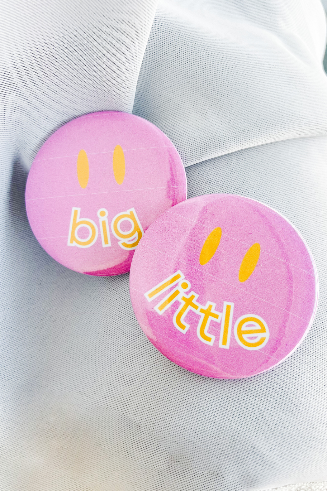 "Big/Little" Button