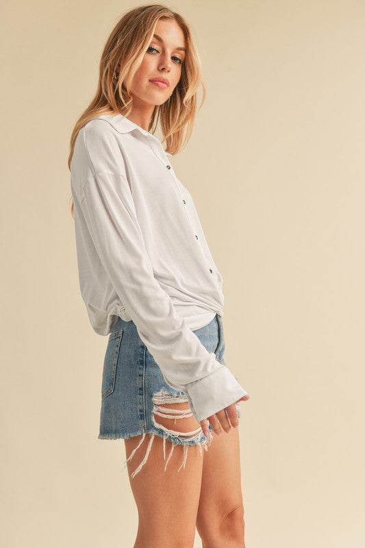 Aemi + Co Twisted Hemline Button Detail Collared Neck Top