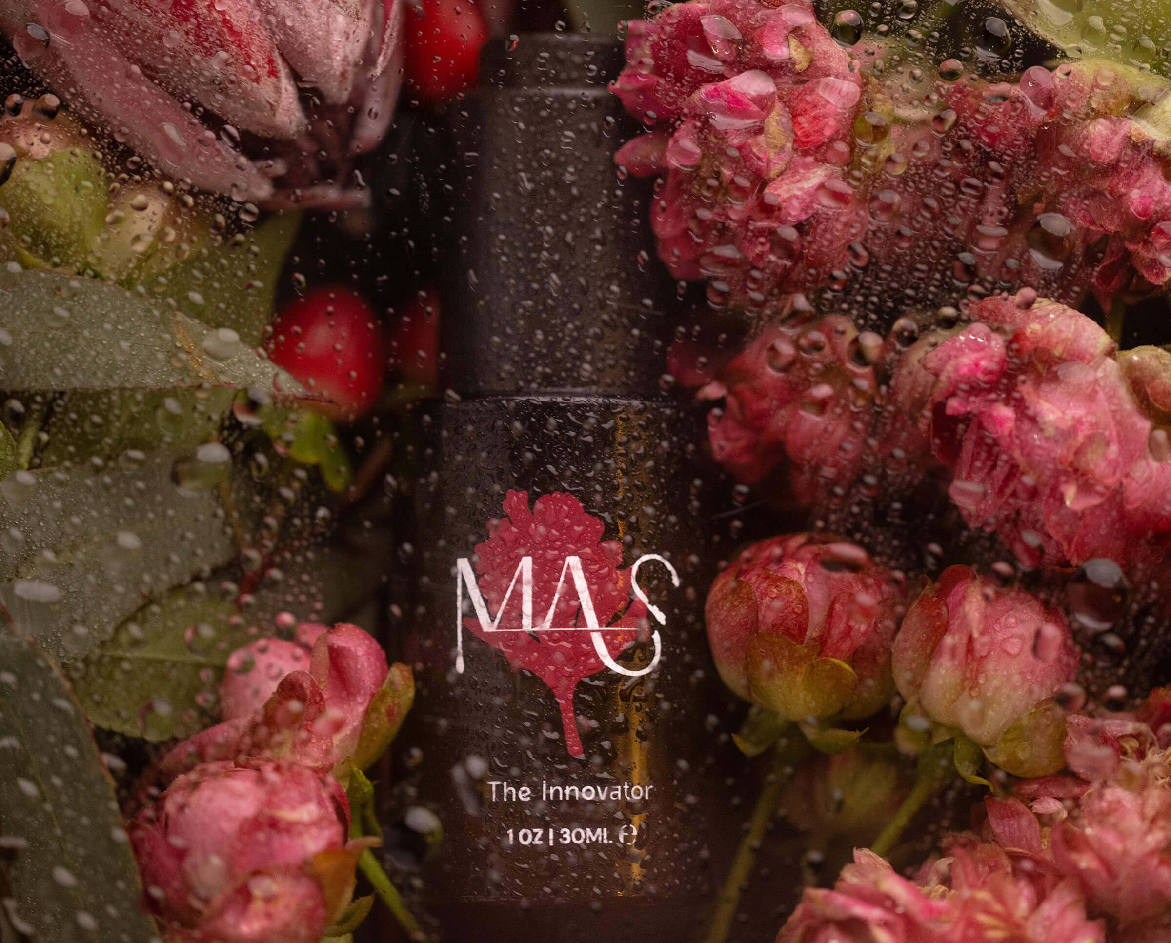 The Innovator product bottle in flowers