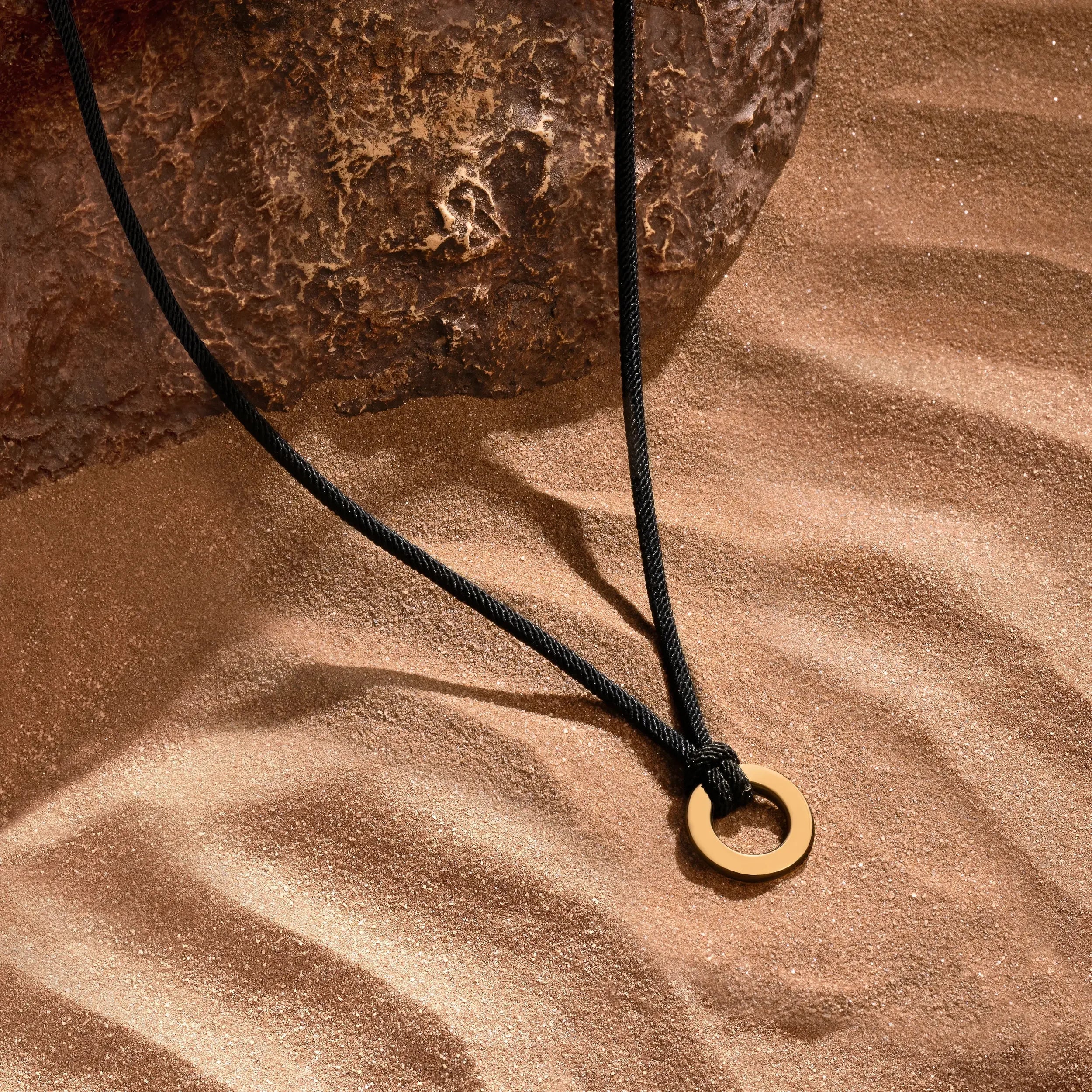 Inspired Revival Karma Circle Black String Necklace