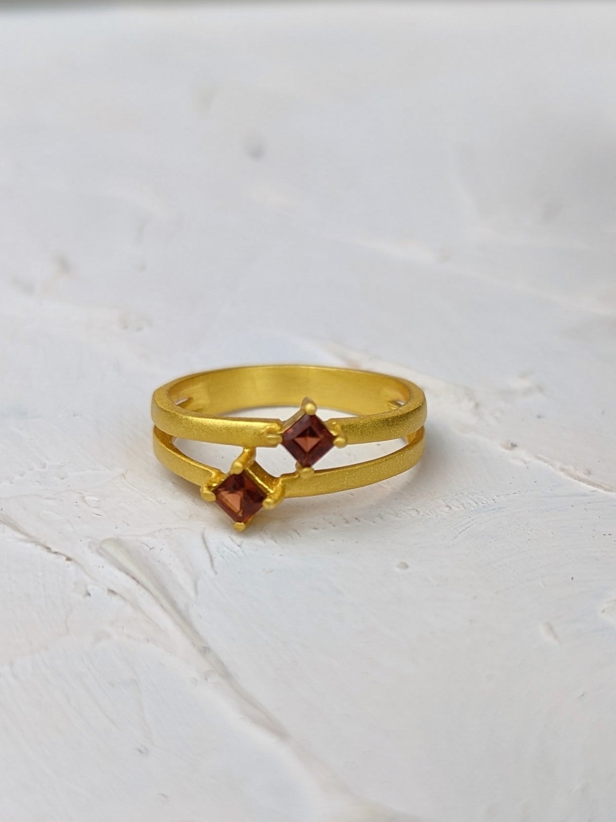 Garnet and Gold Split Shank Ring