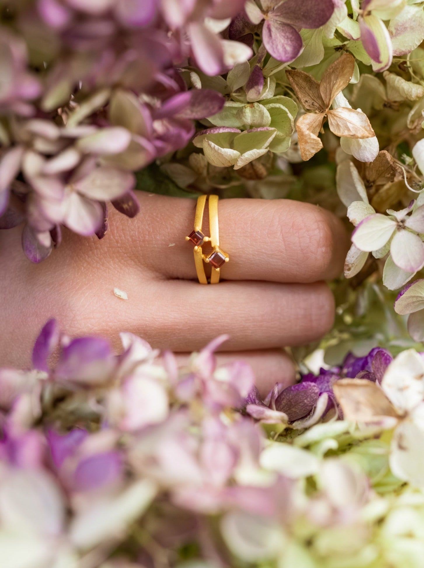 Garnet and Gold Split Shank Ring