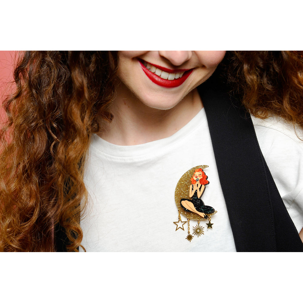 Singer sitting on the Moon Brooch by Laliblue