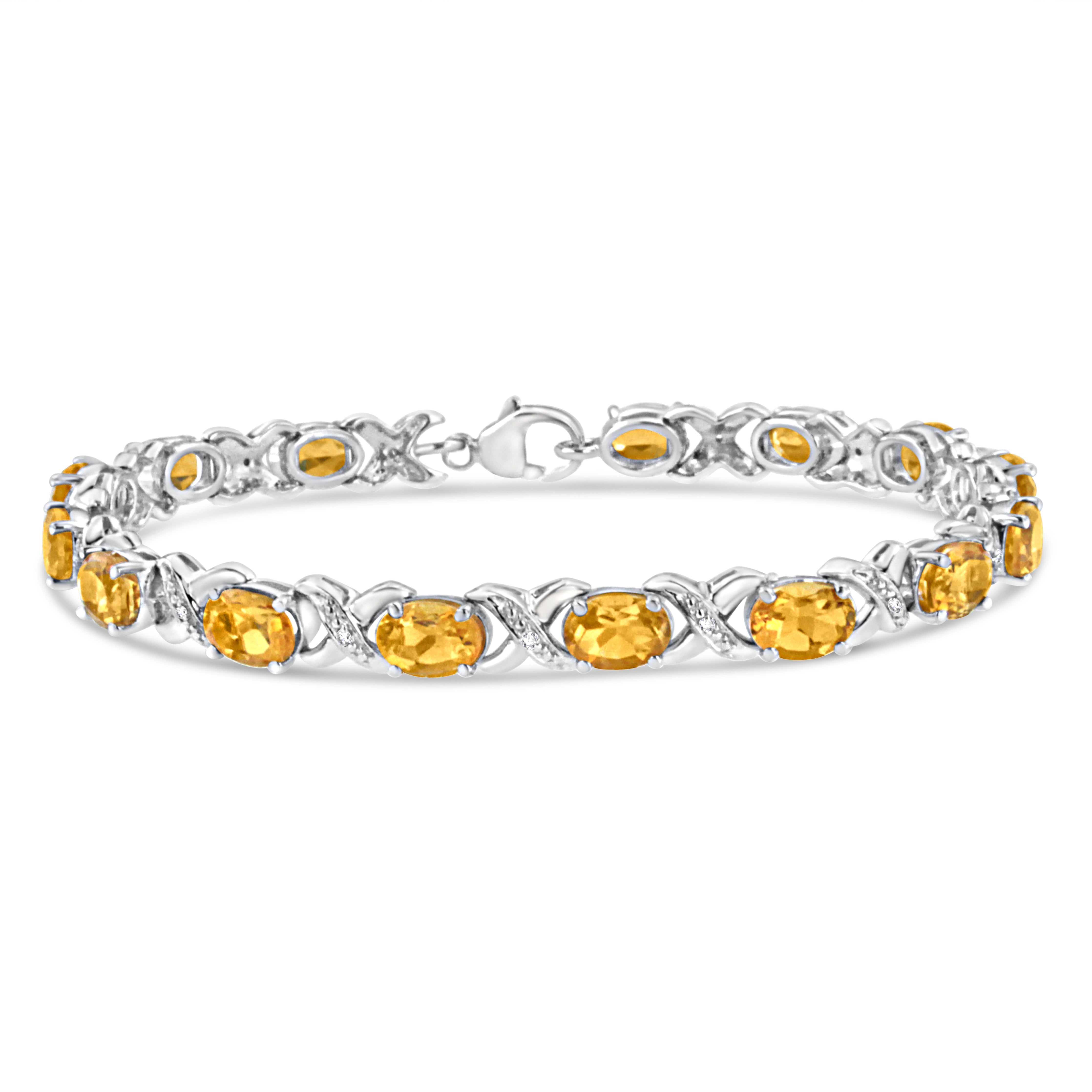 .925 Sterling Silver 7X5 Mm Oval Cut Orange Citrine And 1/20 Cttw Round Cut Diamond Fashion Tennis Bracelet (I-J Color, I1-I2 Clarity) - 7"