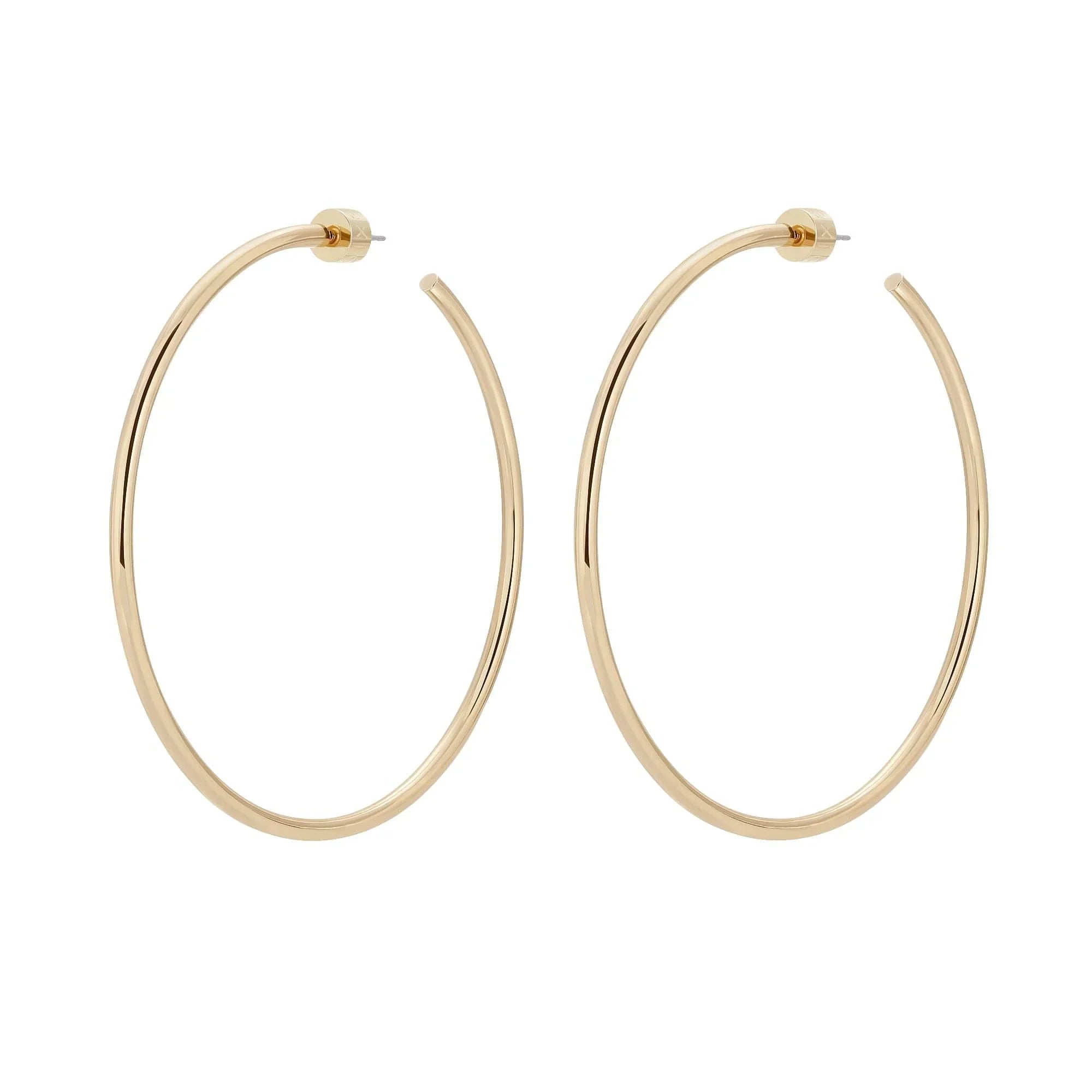 Gold hoop earrings in the 2.5 inch Ultimate Hoops jewelry collection