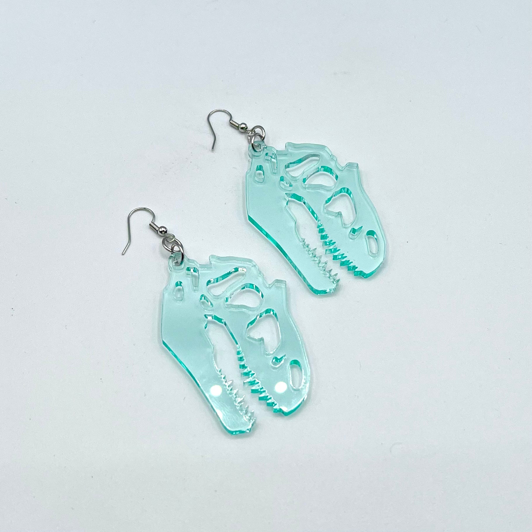 Translucent T-Rex Skull Earrings - Green by BOBBYK