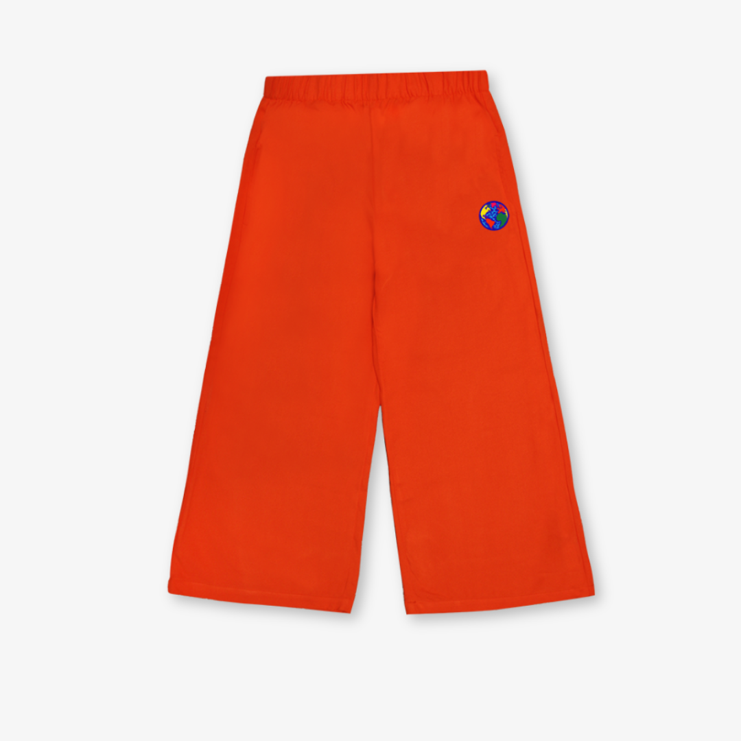 Solid grenadine fluid pants in Ecovero viscose for children - Orange