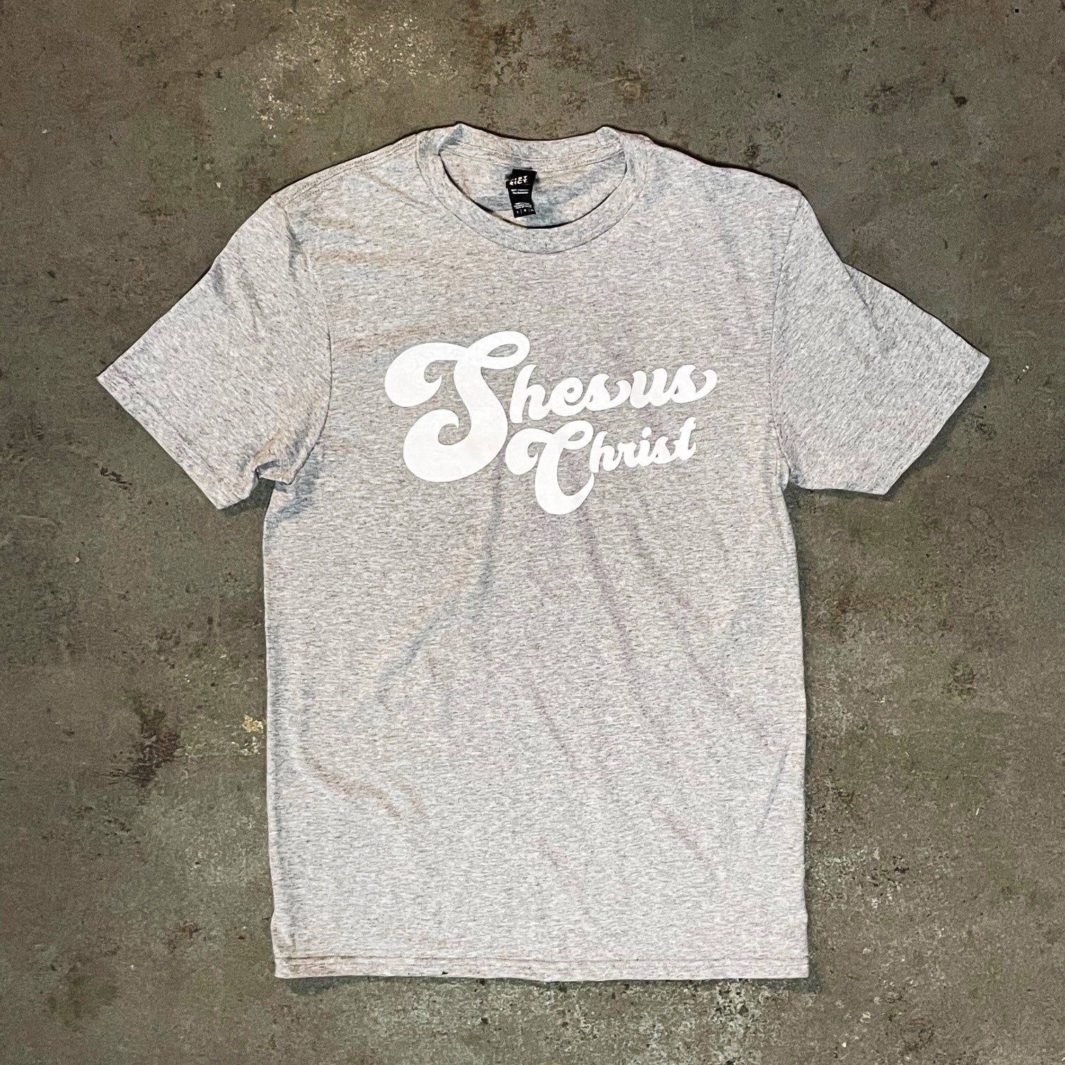 Shesus Christ T-Shirt by BOBBYK