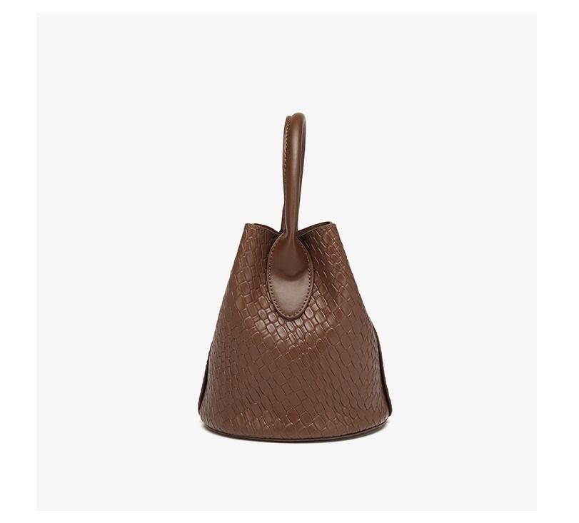 Simple niche woven pattern handbag bucket bag women's bag tide 2025 new senior sense shoulder bag crossbody bag