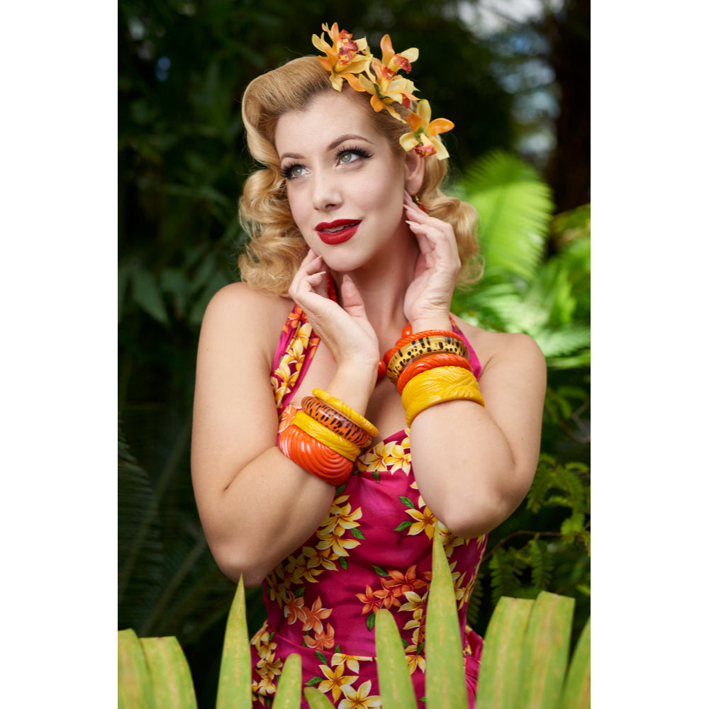 Wide Papaya Heavy Carve Fakelite Bangle by Splendette