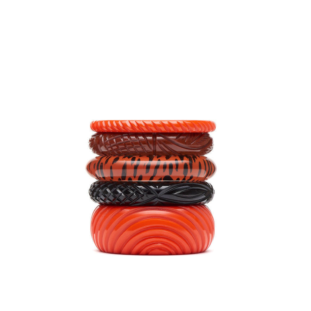 Wide Papaya Heavy Carve Fakelite Bangle by Splendette