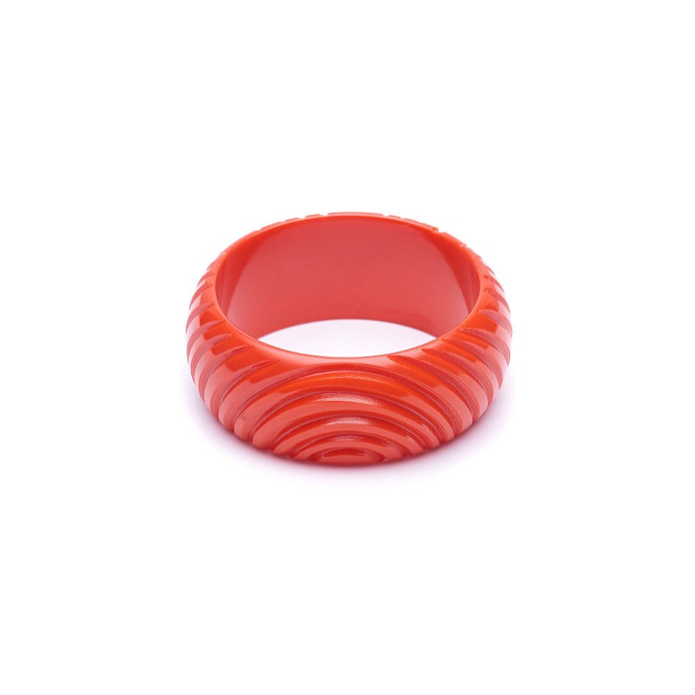 Wide Papaya Heavy Carve Fakelite Bangle by Splendette